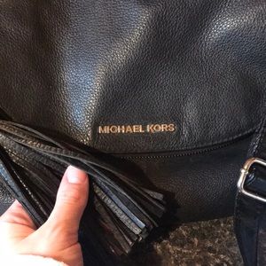 Michael Kors purse and matching wallet.